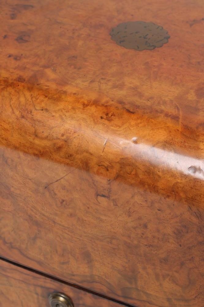 A VICTORIAN BURR WALNUT AND BRASS MOUNTED DECANTER BOX of square form with brass campaign carrying Image