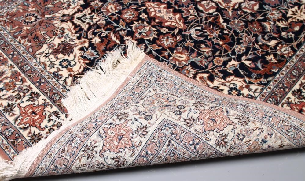 A PERSIAN STYLE RUG Image