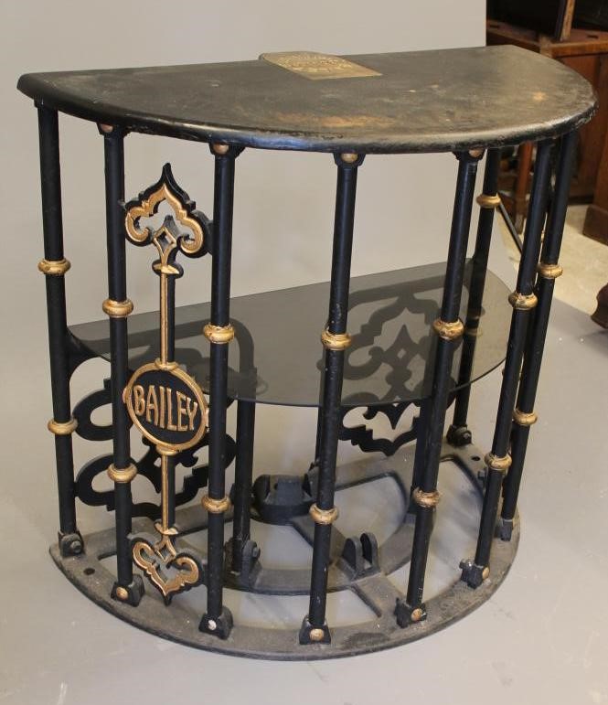 A VICTORIAN CAST IRON TURNSTILE CONVERTED INTO A BAR Image
