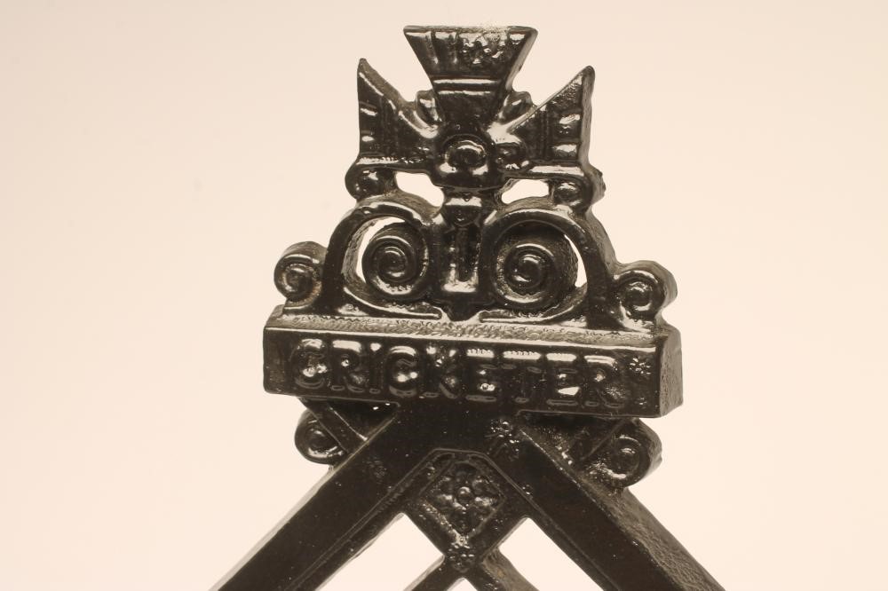A VICTORIAN CAST IRON "CRICKETER" STICK STAND of semi circular outline with drip tray to base Image