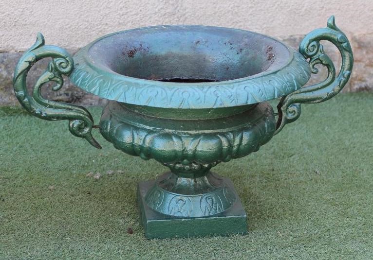 A PAIR OF CAST IRON URNS of shallow campana form with raised foliate scrolled handles Image