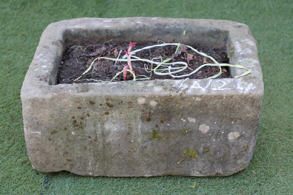 A SANDSTONE TROUGH of finely cut oblong form Image