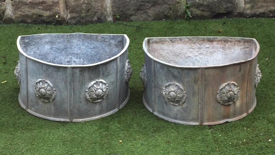 A PAIR OF LEAD PLANTERS Image