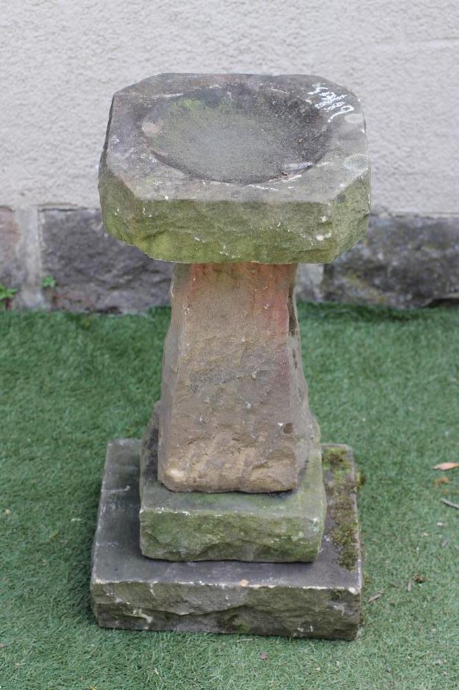 A SANDSTONE BIRD BATH Image