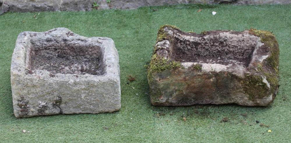A SMALL SANDSTONE TROUGH of rough hewn oblong form Image