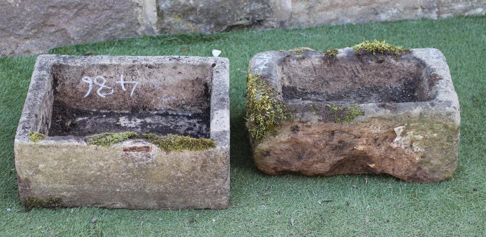 A SMALL SANDSTONE TROUGH of rough hewn oblong form Image