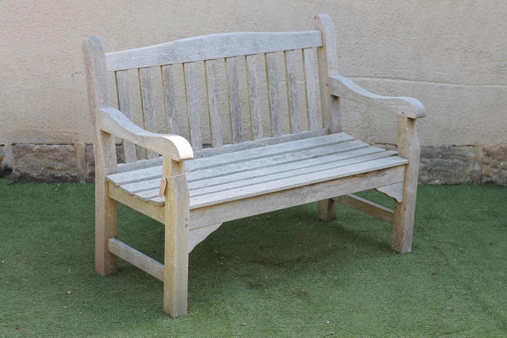 A TEAK BENCH Image