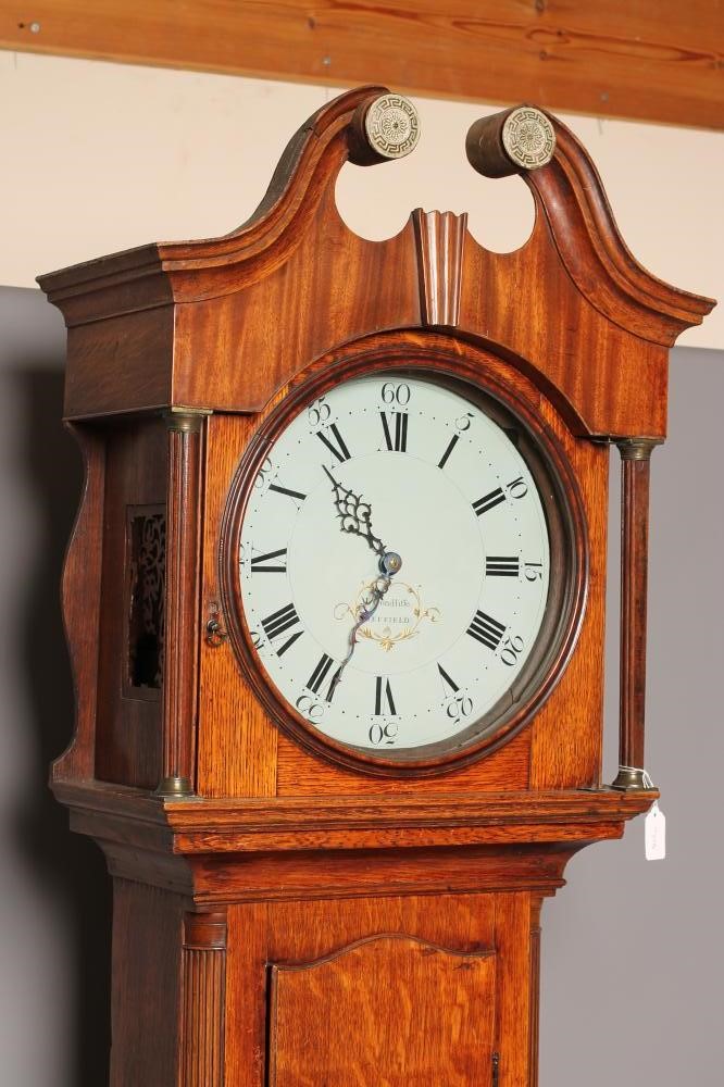 AN OAK LONGCASE CLOCK signed W. Condliffe Image
