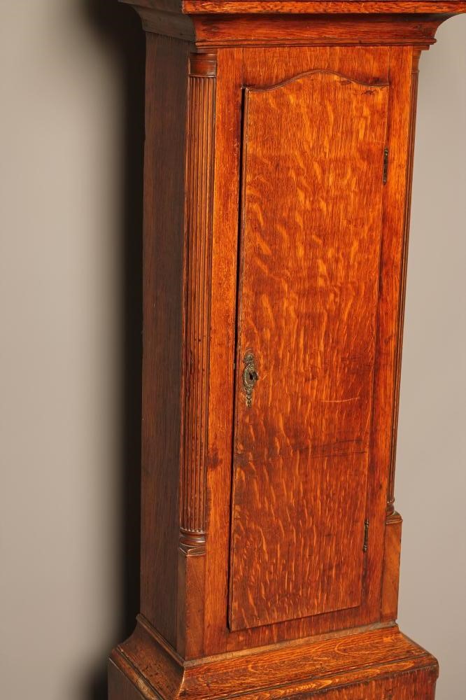 AN OAK LONGCASE CLOCK signed W. Condliffe Image