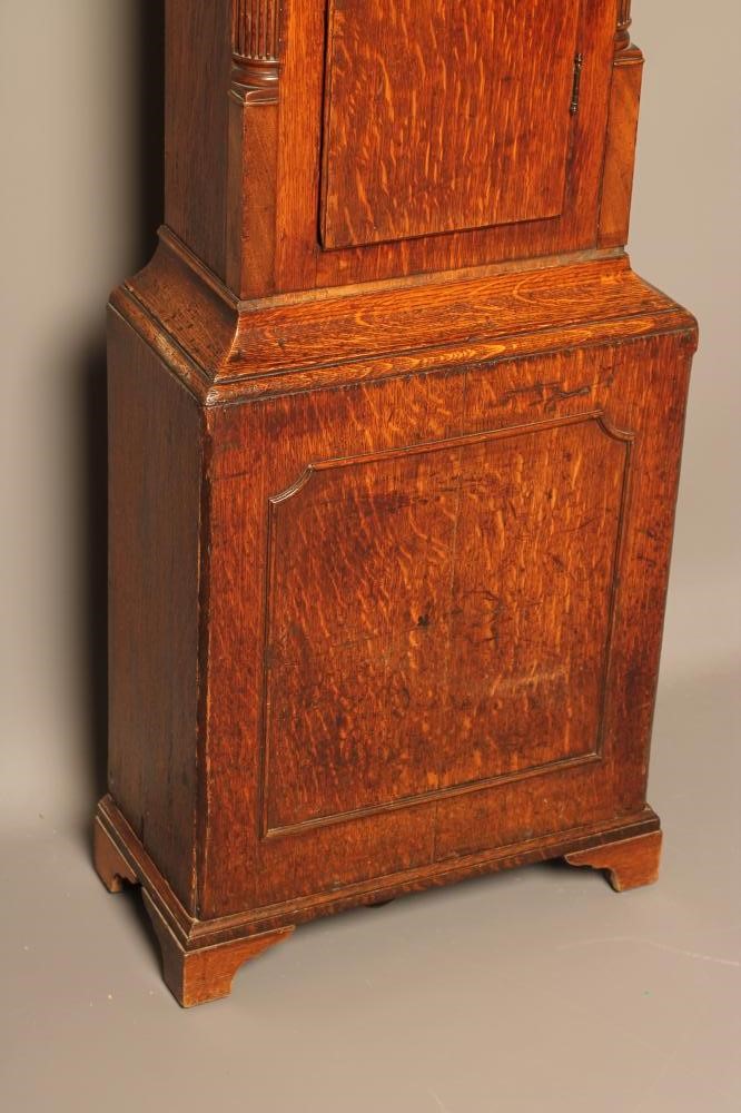 AN OAK LONGCASE CLOCK signed W. Condliffe Image