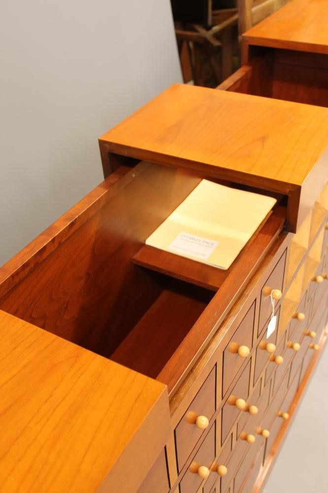 A CHERRY WOOD ARCHITECTURAL DRINKS CABINET by the Italian maker Sellaro Image