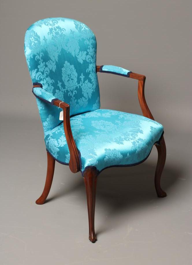 A MAHOGANY ELBOW CHAIR Image