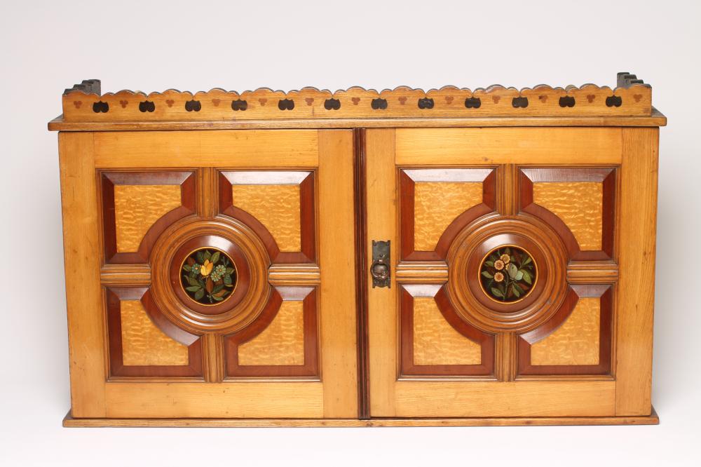 AN AESTHETIC ASH WALL CABINET of oblong form Image