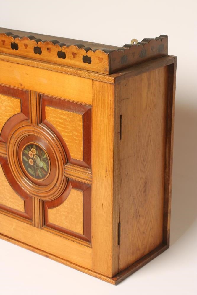 AN AESTHETIC ASH WALL CABINET of oblong form Image