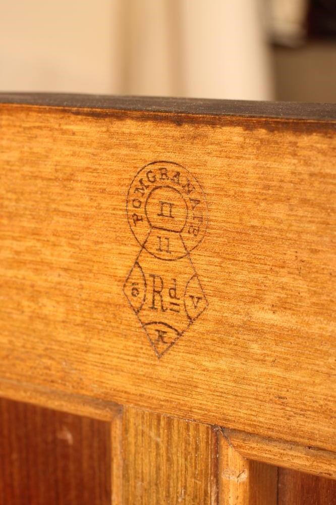 AN AESTHETIC ASH WALL CABINET of oblong form Image