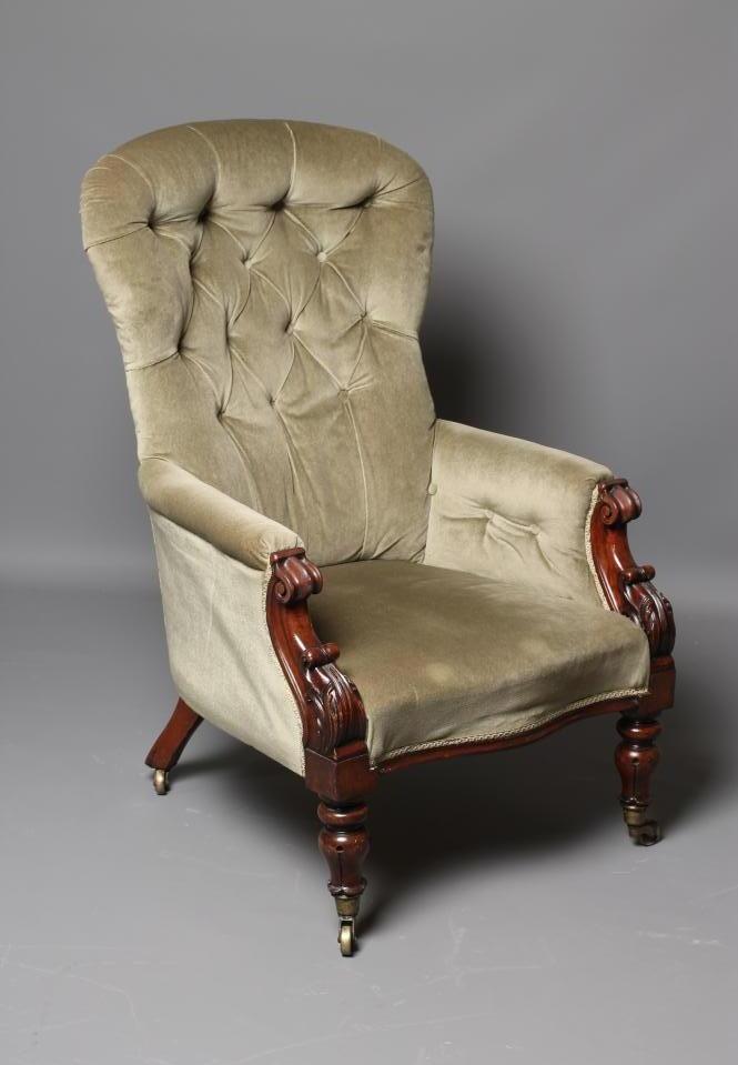 AN EARLY VICTORIAN MAHOGANY FRAMED ARMCHAIR button upholstered in pale green dralon Image