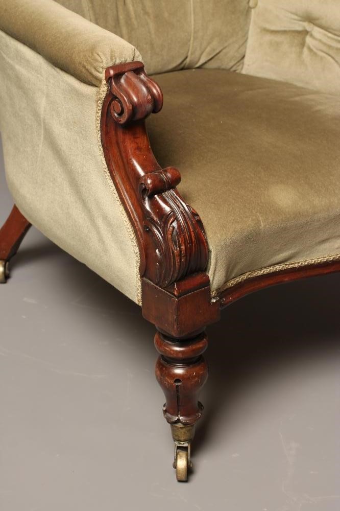 AN EARLY VICTORIAN MAHOGANY FRAMED ARMCHAIR button upholstered in pale green dralon Image