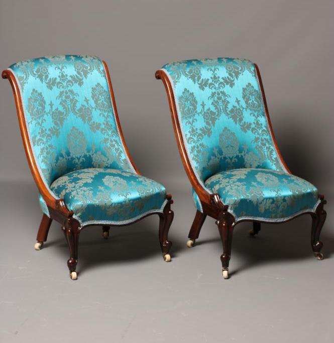 A PAIR OF VICTORIAN ROSEWOOD SALON CHAIRS of Grecian form upholstered in turquoise silk brocade Image