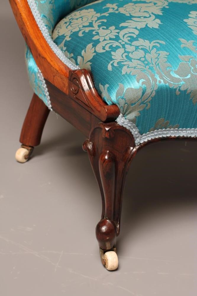 A PAIR OF VICTORIAN ROSEWOOD SALON CHAIRS of Grecian form upholstered in turquoise silk brocade Image