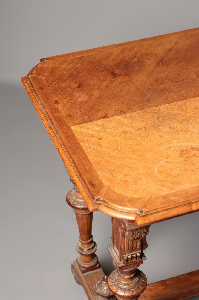 A CARVED OAK AND PARCEL GILT LIBRARY TABLE Image