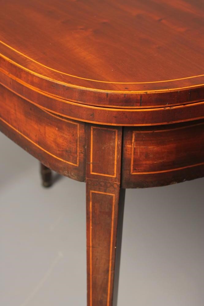 A GEORGIAN MAHOGANY FOLDING TEA TABLE Image