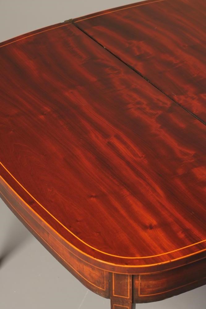 A GEORGIAN MAHOGANY FOLDING TEA TABLE Image