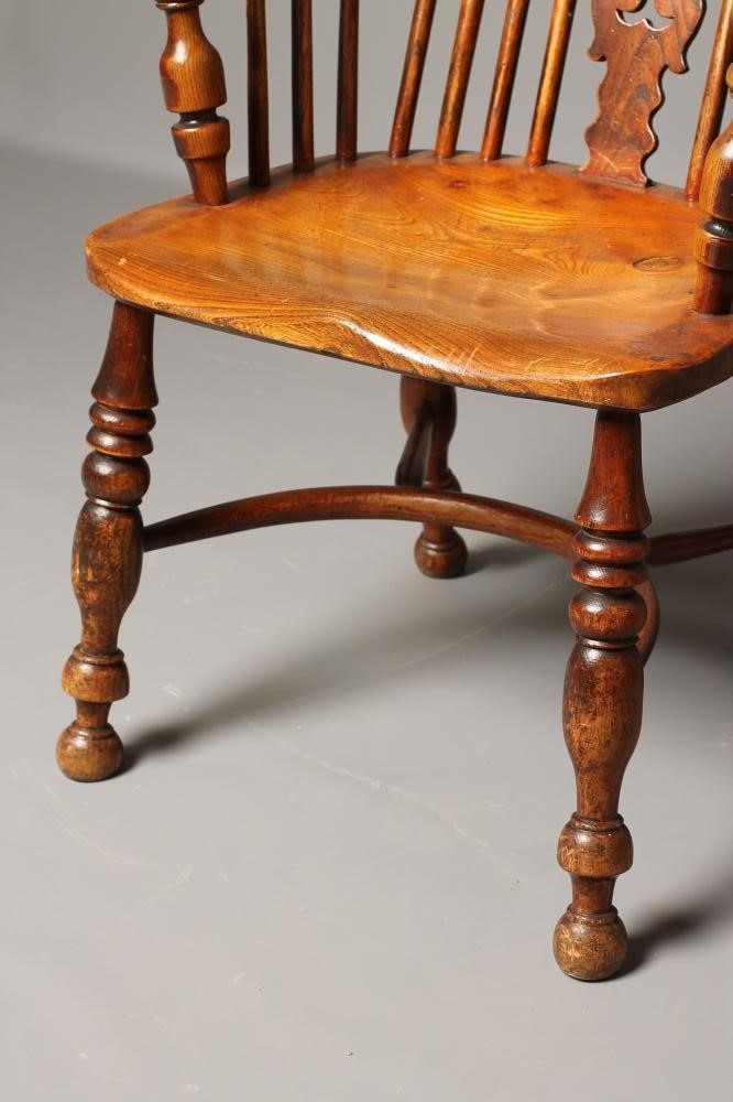 AN ASH AND ELM WINDSOR ARMCHAIR Image