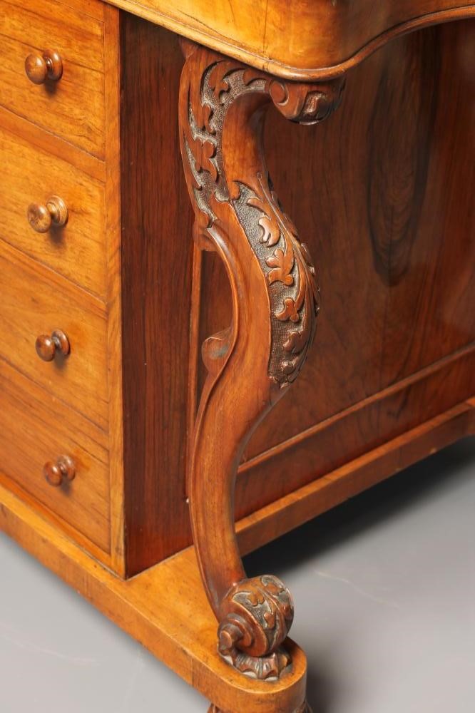 A VICTORIAN WALNUT DAVENPORT Image