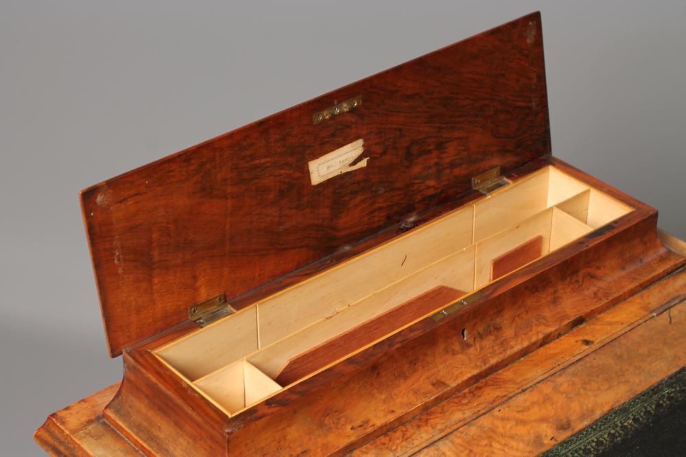 A VICTORIAN WALNUT DAVENPORT Image