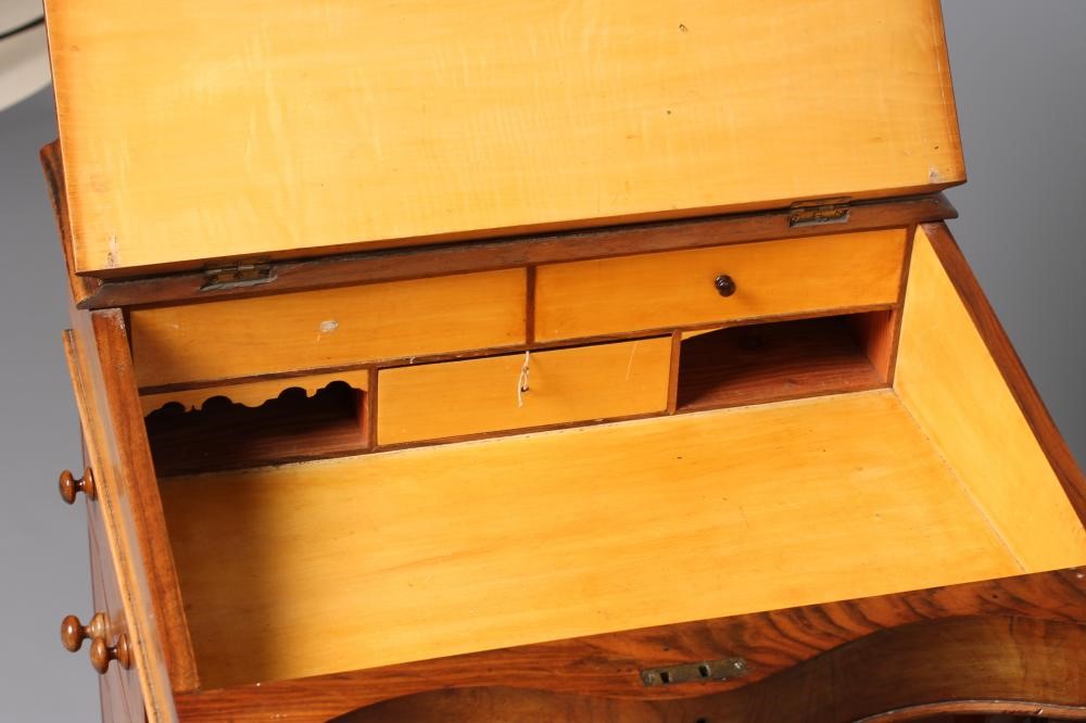 A VICTORIAN WALNUT DAVENPORT Image