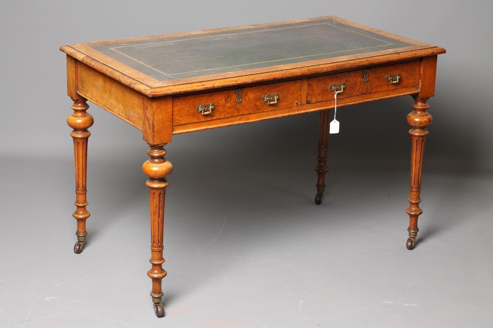 A VICTORIAN POLLARD OAK WRITING TABLE Image