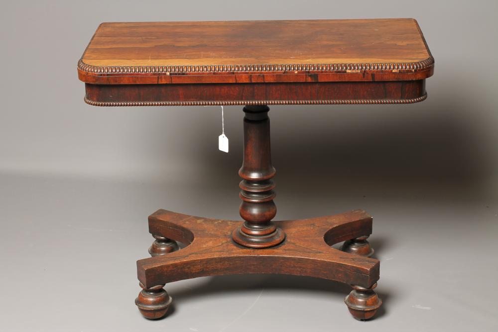 A WILLIAM IV ROSEWOOD FOLDING CARD TABLE of rounded oblong form Image