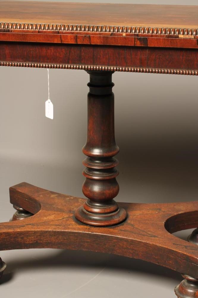 A WILLIAM IV ROSEWOOD FOLDING CARD TABLE of rounded oblong form Image