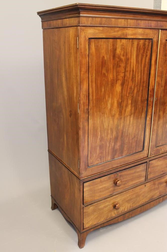 A GEORGIAN MAHOGANY LINEN PRESS Image