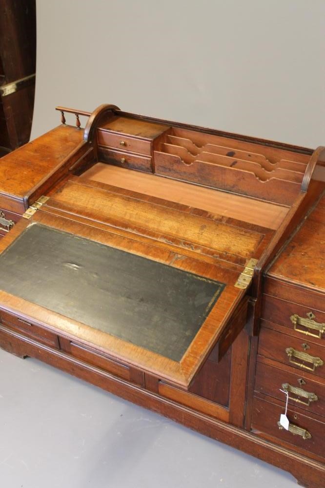 A LATE VICTORIAN WALNUT "BRADFORD DESK LIBRARY VERSION" by Christopher Pratt & Sons Image