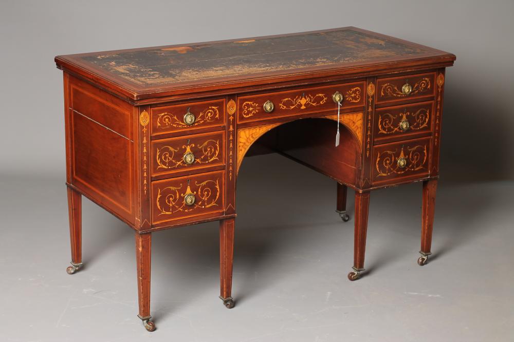 AN EDWARDIAN MAHOGANY AND FOLIATE MARQUETRY DESK of oblong form crossbanded with stringing Image