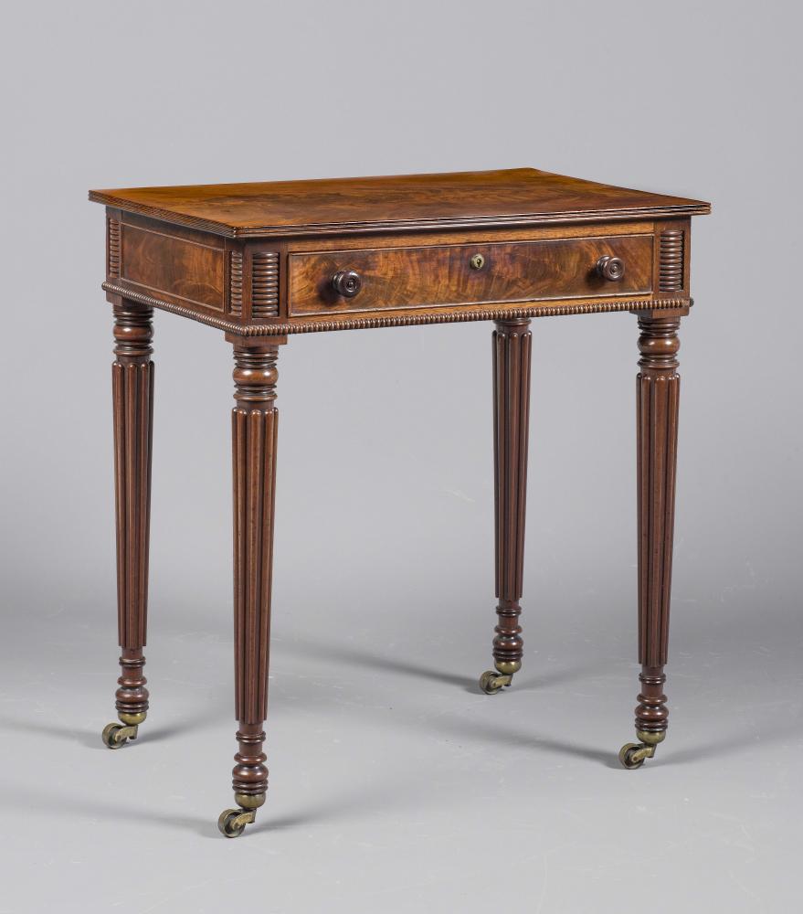 A SMALL MAHOGANY WRITING TABLE Image