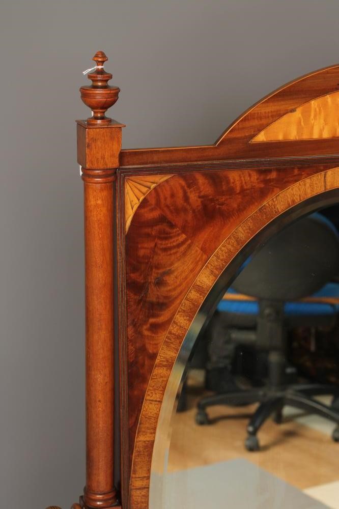 A MAHOGANY CHEVAL MIRROR Image