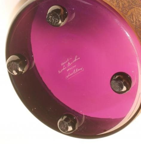 A MOSER AMETHYST GLASS POWDER BOX AND COVER of cylindrical form raised upon four ball feet Image