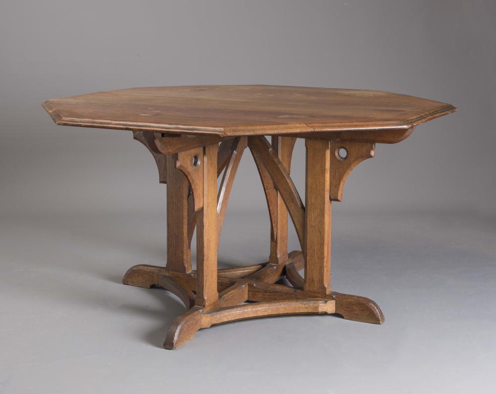 AN OAK REFORMED GOTHIC CENTRE TABLE in the manner of W N Pugin Image