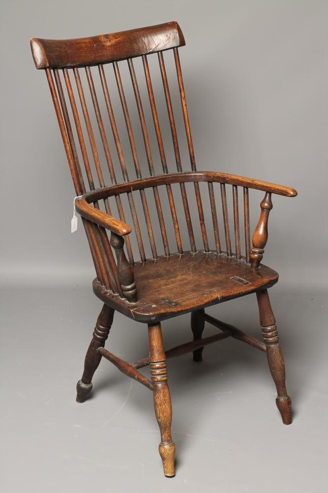 AN ASH AND ELM COMB BACK WINDSOR ARMCHAIR Image