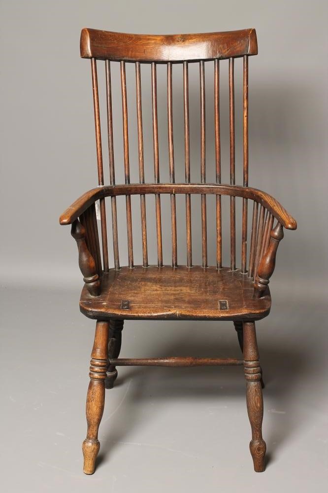 AN ASH AND ELM COMB BACK WINDSOR ARMCHAIR Image