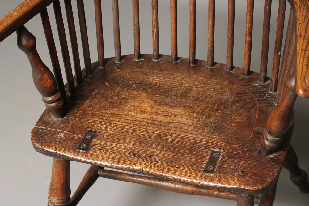 AN ASH AND ELM COMB BACK WINDSOR ARMCHAIR Image