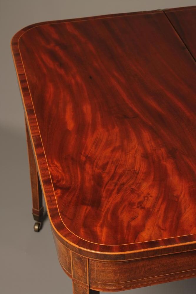 A GEORGIAN MAHOGANY FOLDING TEA TABLE Image
