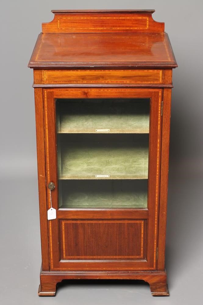 AN EDWARDIAN MAHOGANY AND SATINWOOD BANDED MUSIC CABINET Image