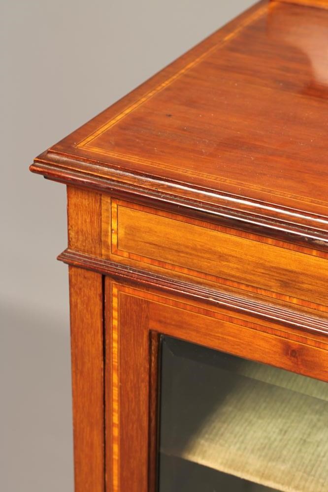 AN EDWARDIAN MAHOGANY AND SATINWOOD BANDED MUSIC CABINET Image