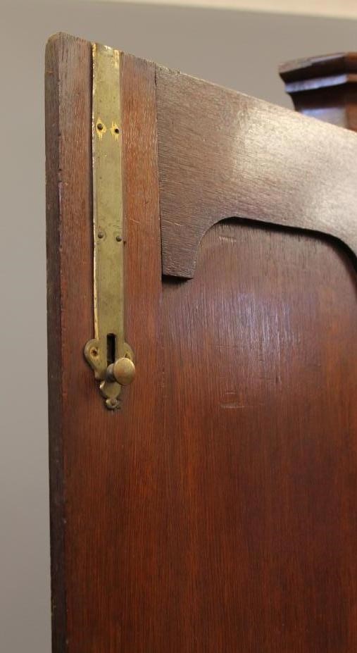 A GEORGIAN OAK STANDING CORNER CUPBOARD Image