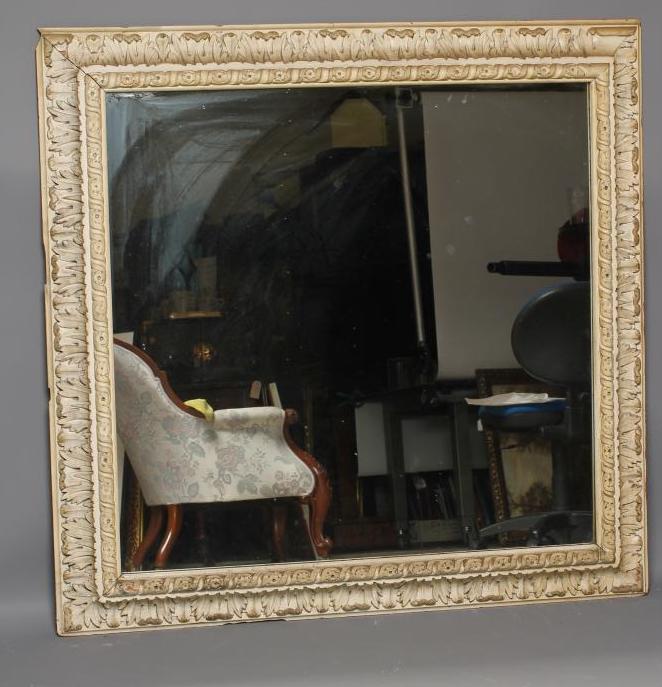 A CARVED LIME WOOD WALL MIRROR Image