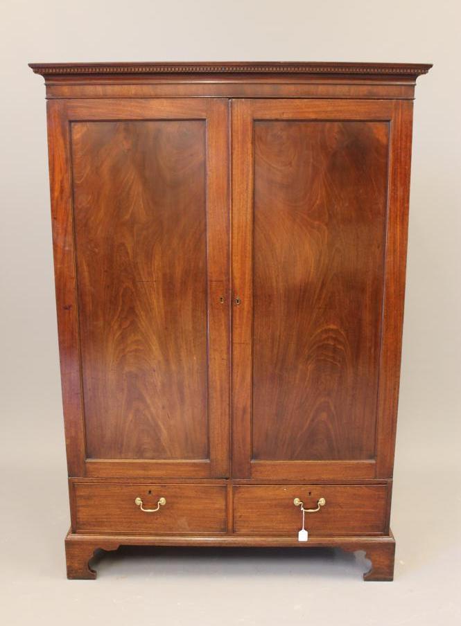A MAHOGANY WARDROBE Image