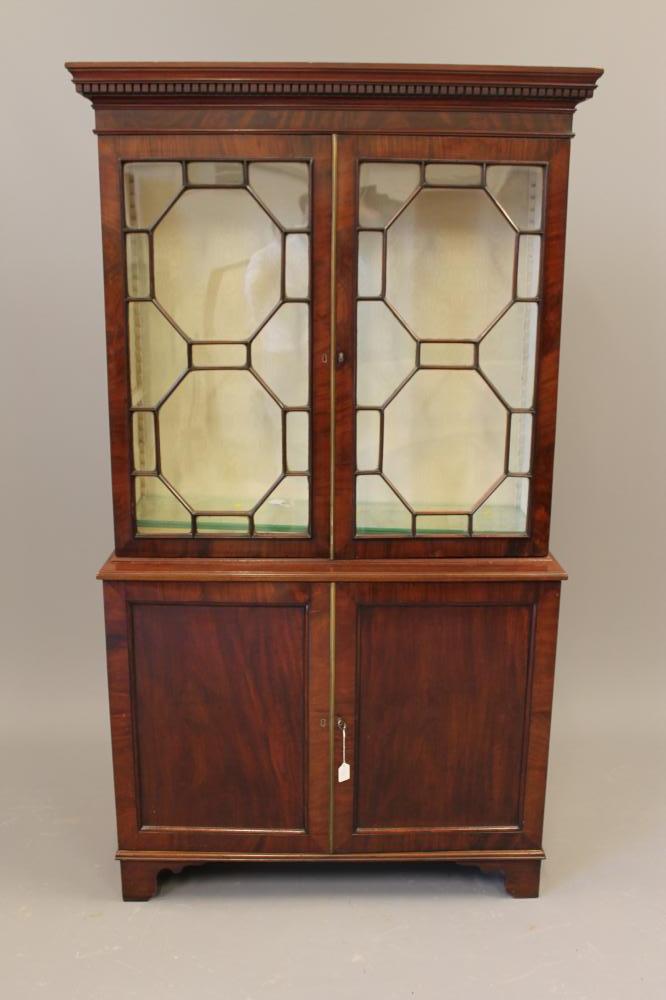 A MAHOGANY BOOKCASE Image